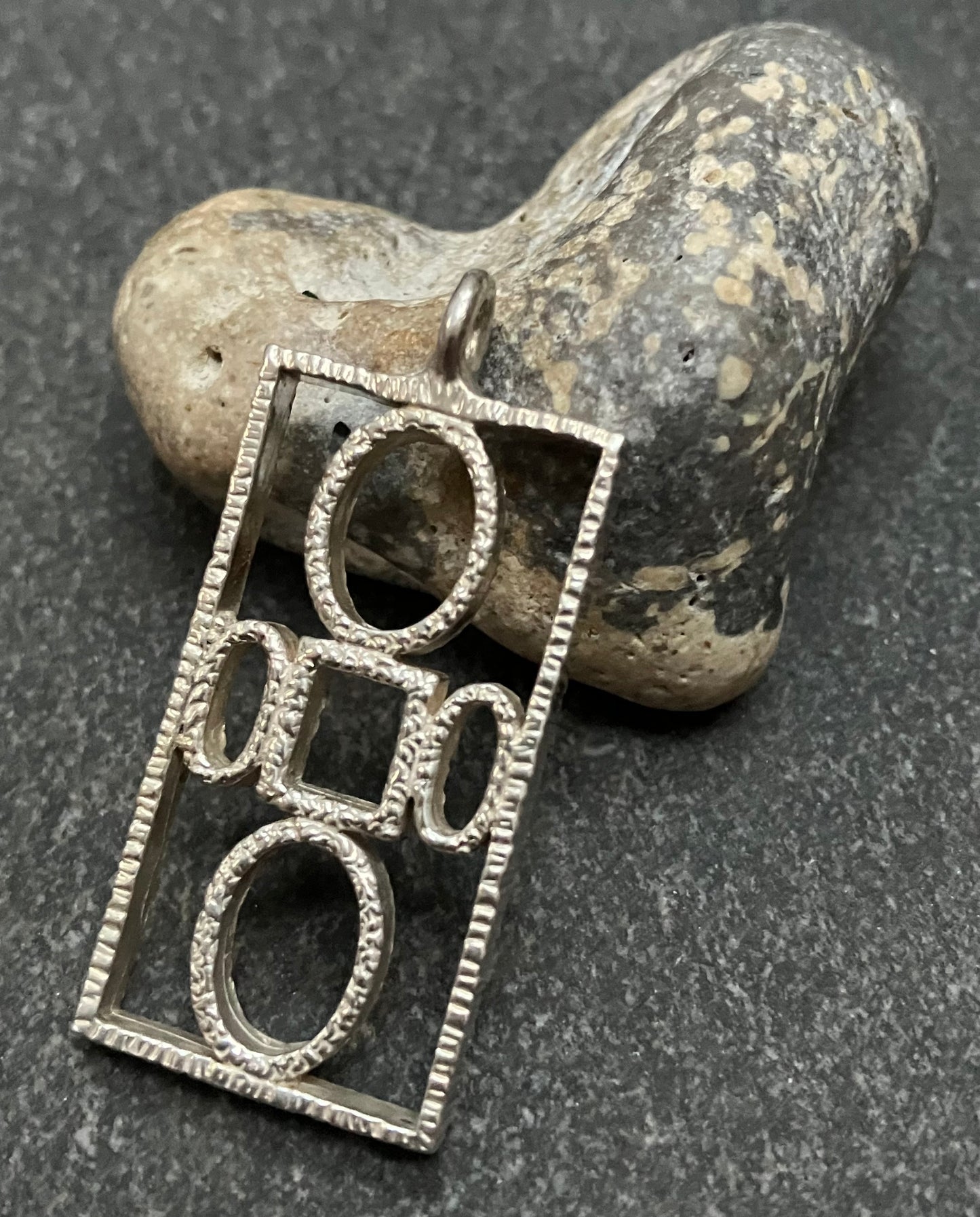 Super example of a vintage Brutalist/Modernist sterling silver pendant by Toye, Kenning & Spencer.