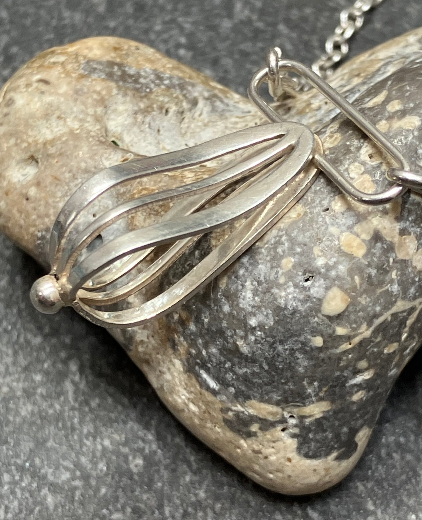 Artisan sterling silver sculptural necklace.