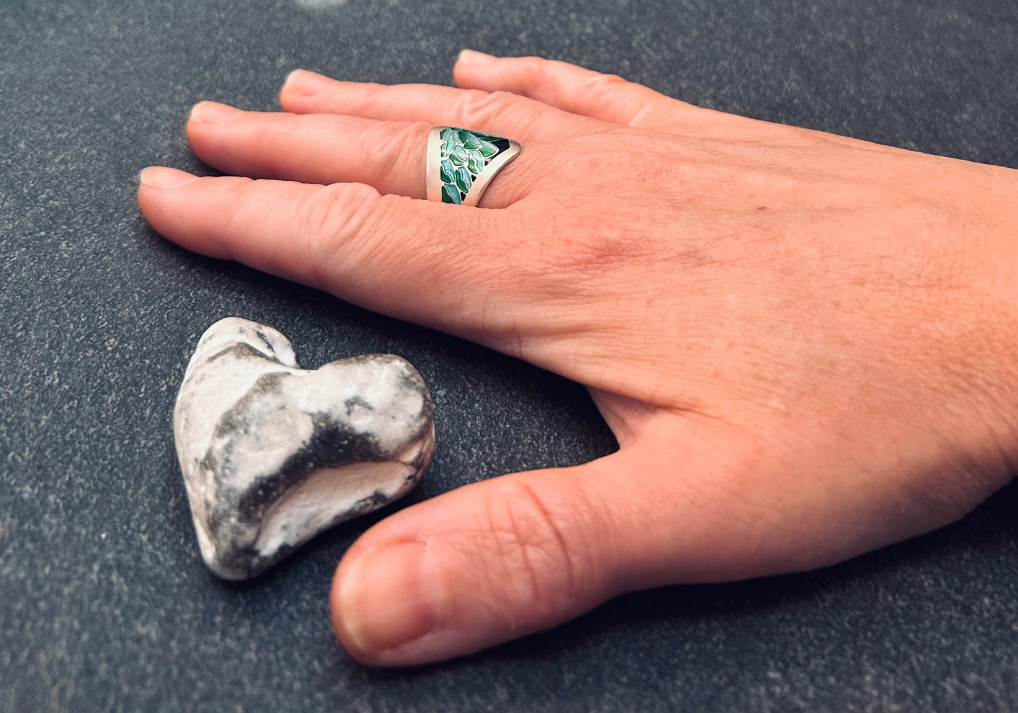 A fantastically detailed vintage sterling silver and enamel ring.