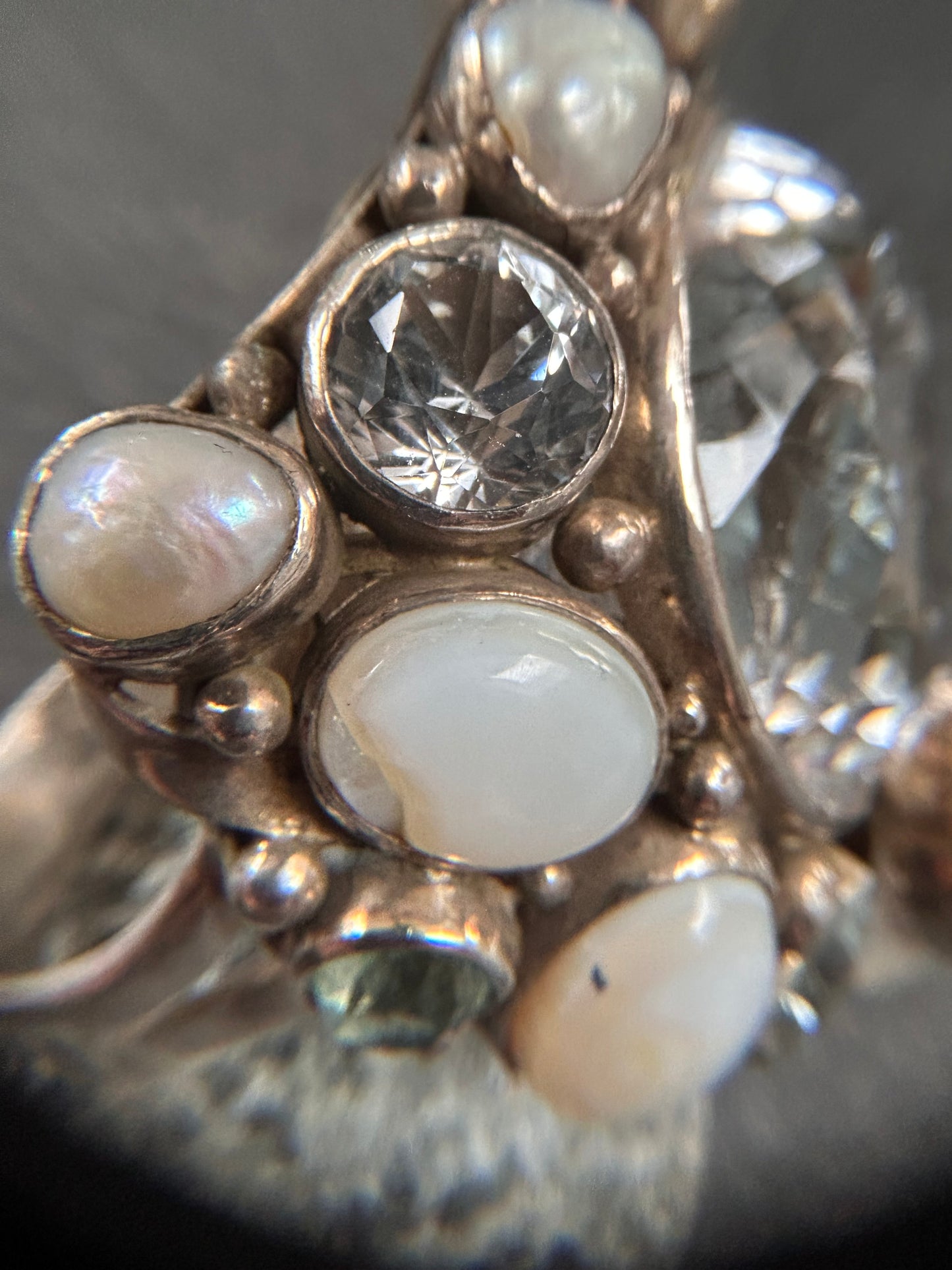 Spectacular Polish Artisan Double-Finger Ring.
Sterling Silver, Rock Crystal, Topaz, Opals, Aquamarine & Pearls.