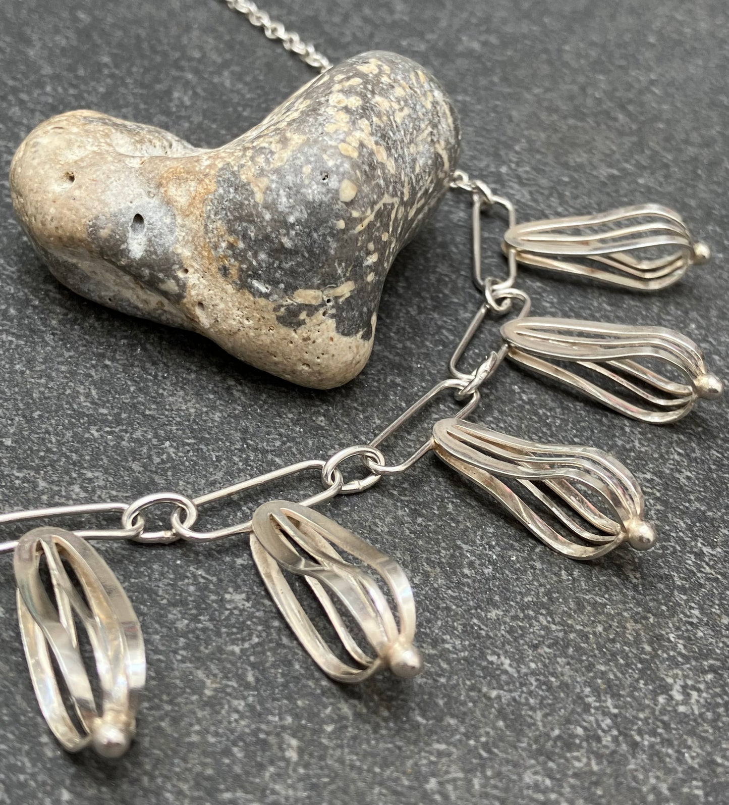 Artisan sterling silver sculptural necklace.