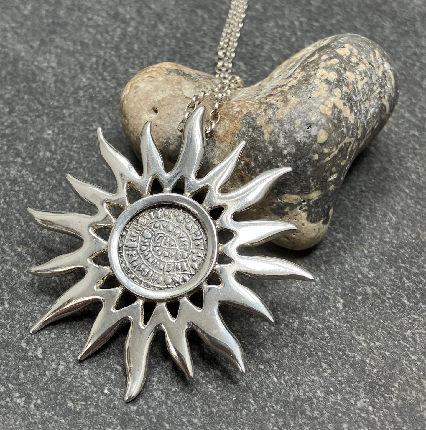 Vintage sterling silver abstract sun or sunflower.