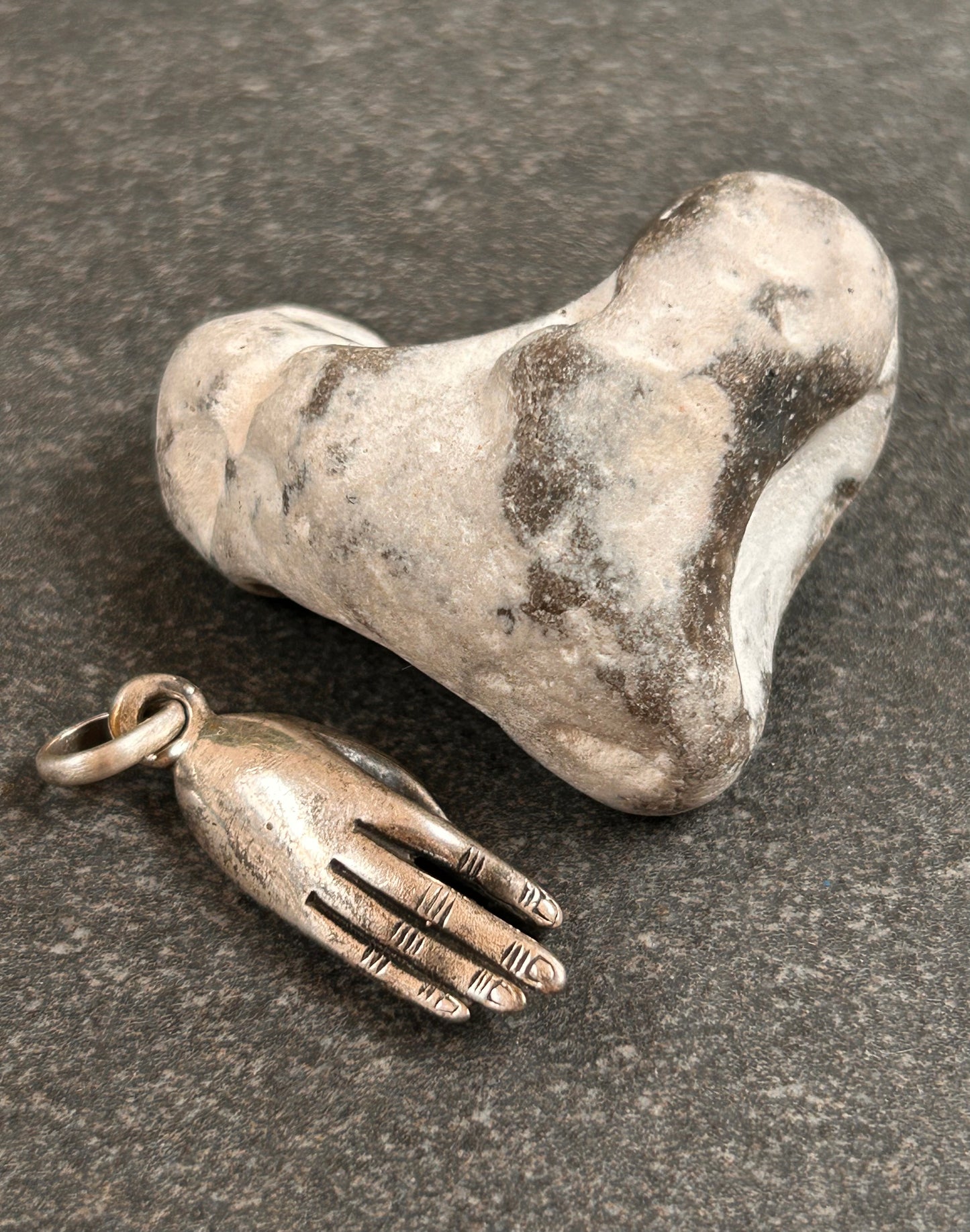 Vintage Hand Pendant
Beautiful vintage hand pendant with index finger and thumb pinched into an elegant pose.