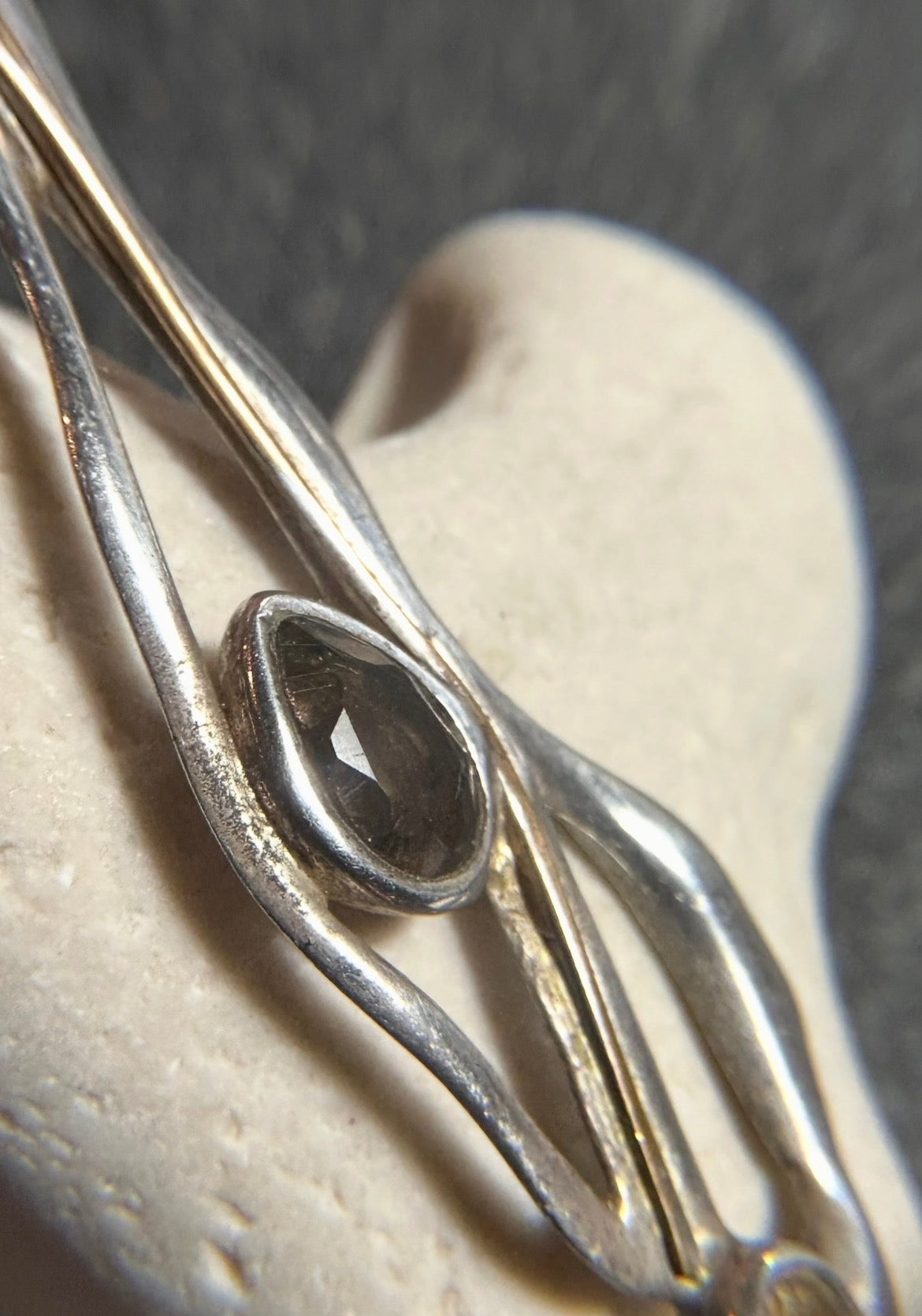 Vintage sterling silver artisan earrings with a graceful organic form.