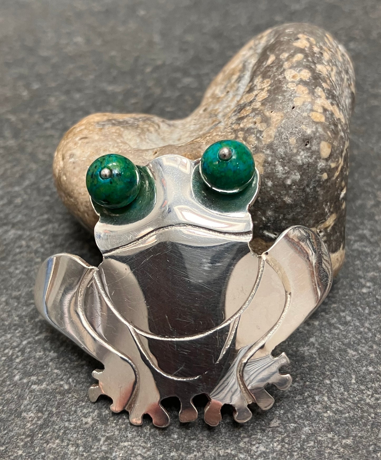 Vintage sterling silver frog pendant with chrysocolla stone sphere eyes.