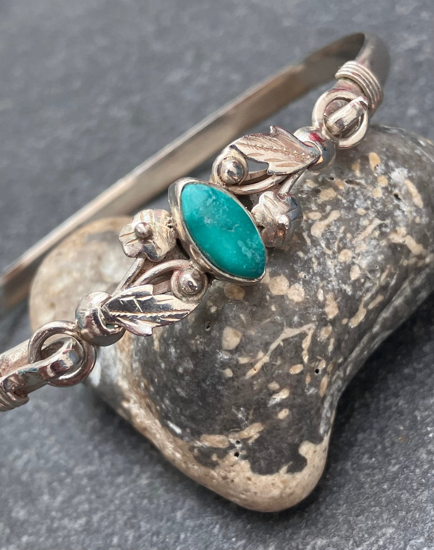 Vintage sterling silver bangle with a fuchsite stone centre.