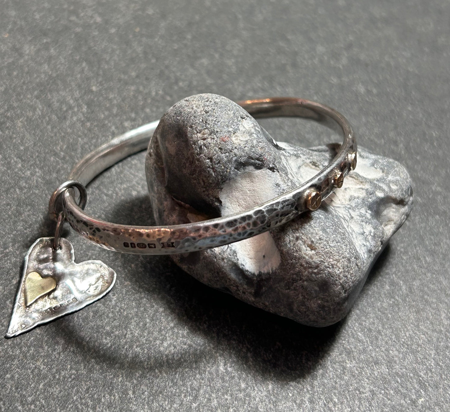 Artisan bangle work ‘X’s and hearts.
