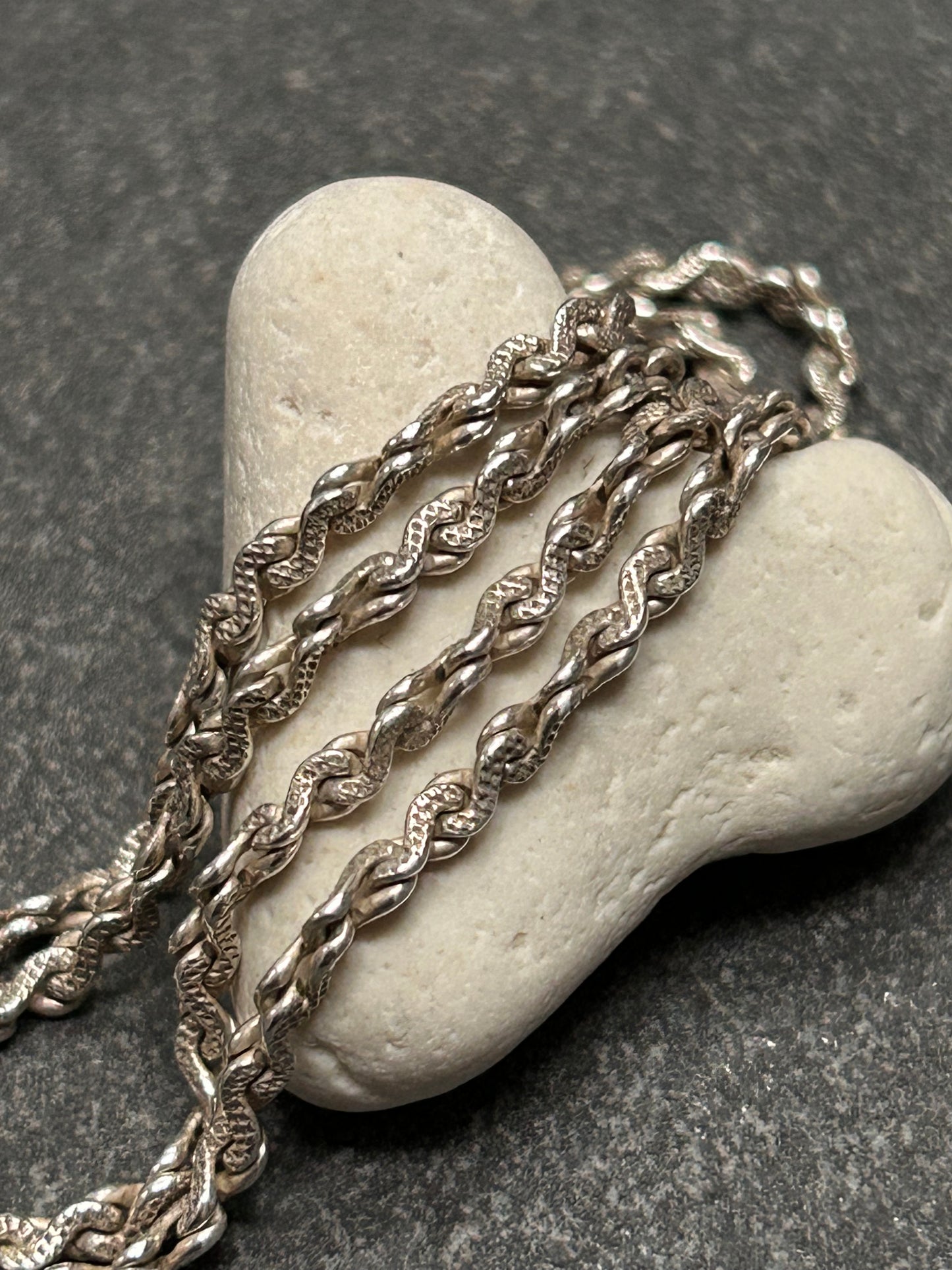 Beautiful vintage sterling silver necklace features elegant infinity links