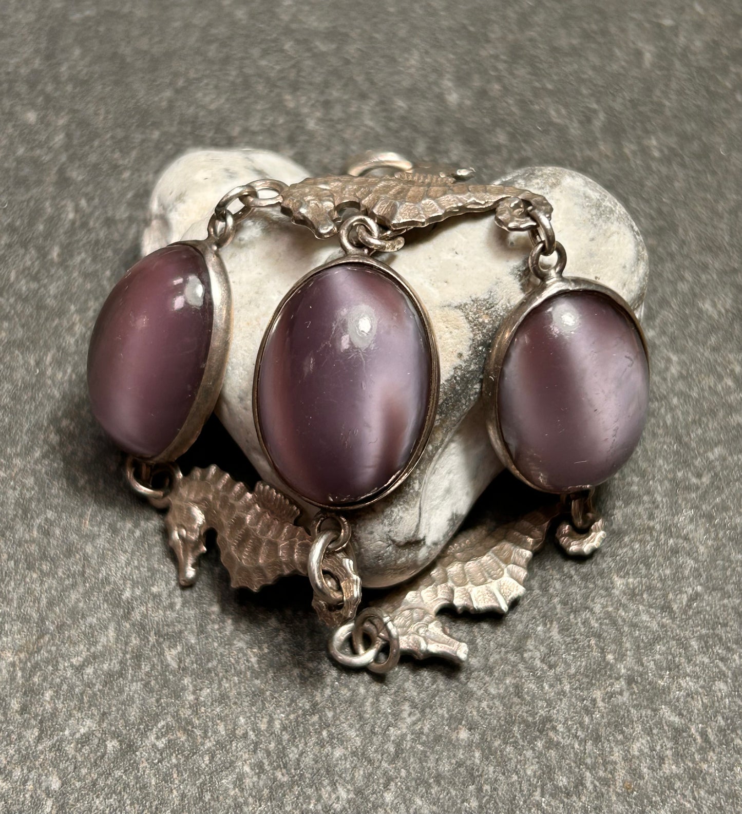 A truly enchanting vintage sterling silver bracelet, featuring four exquisitely detailed seahorses