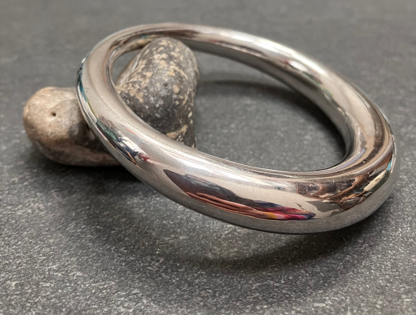 Absolutely beautifully elegant vintage tapered sterling silver bangle.