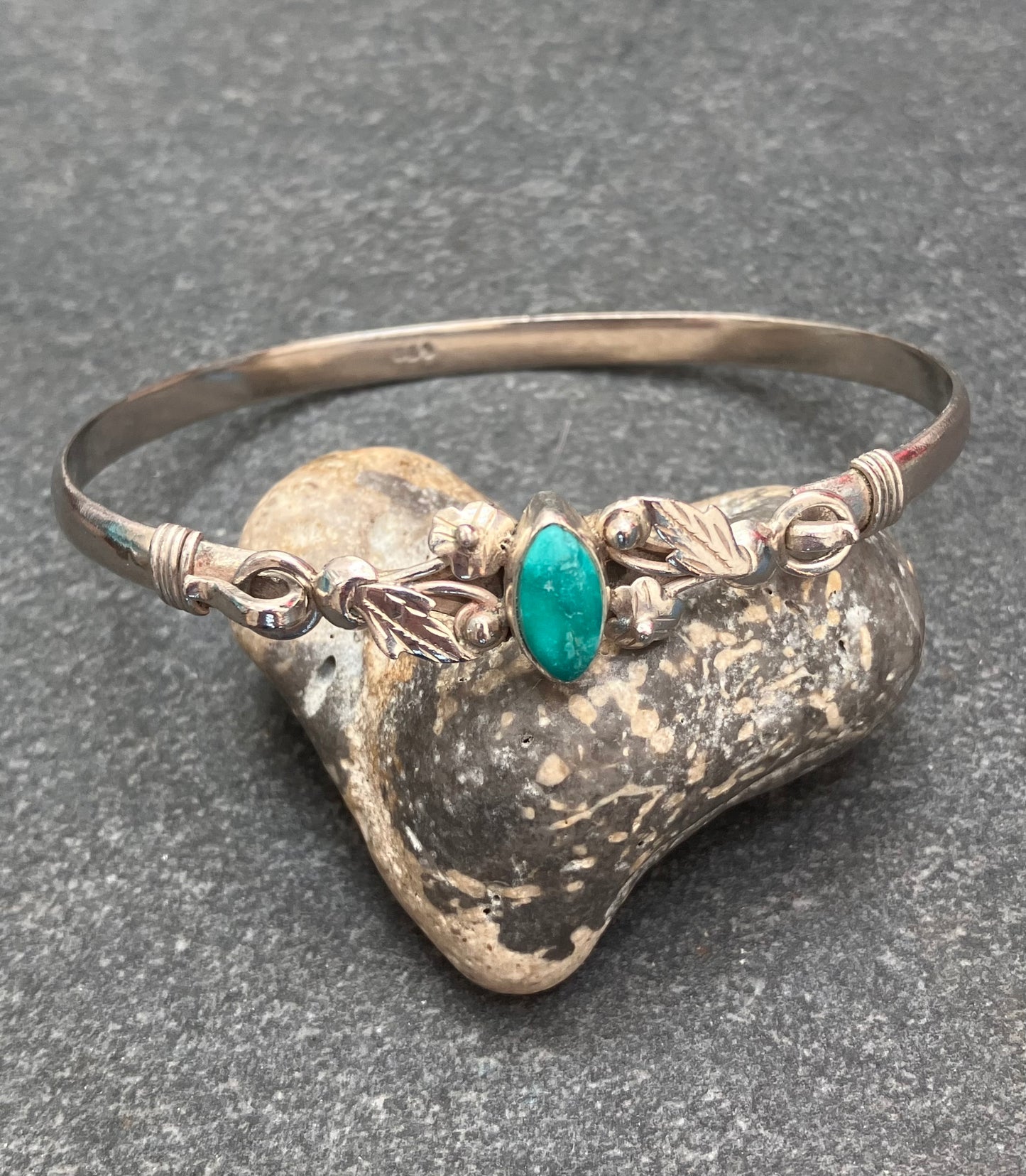 Vintage sterling silver bangle with a fuchsite stone centre.