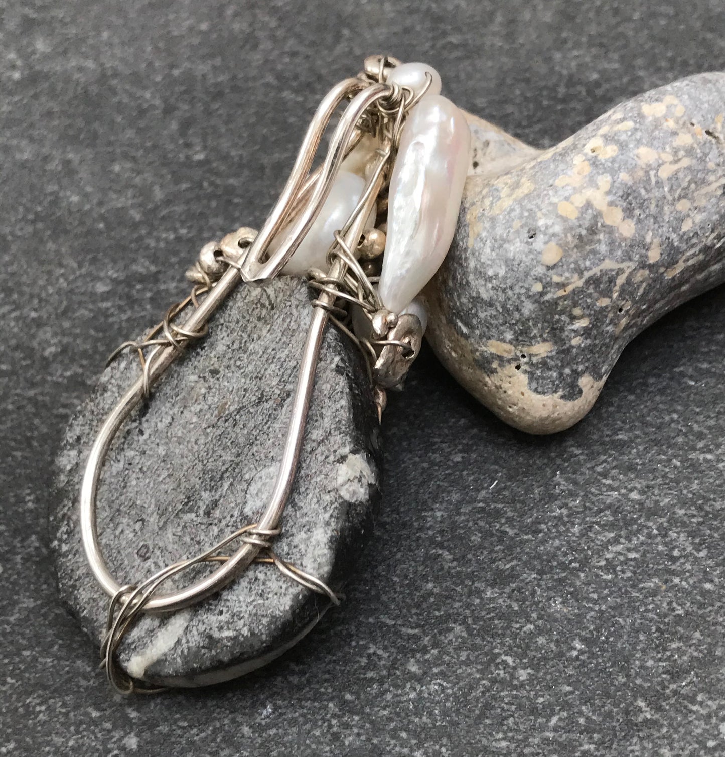 Unique handmade ammonite fossil, pearl and silver pendant.