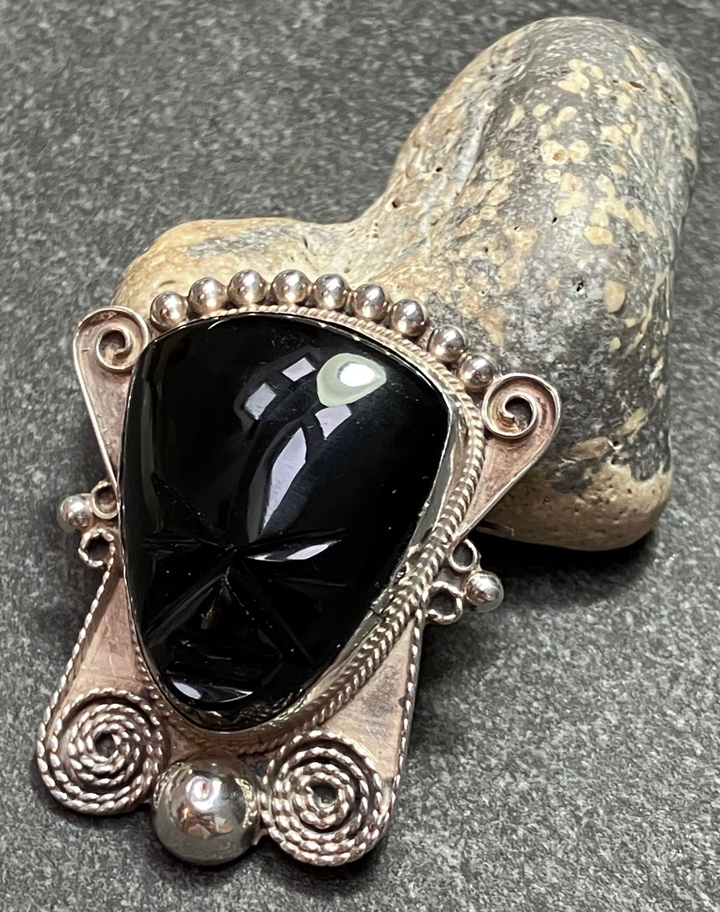 Vintage Mexican onyx and sterling silver warrior brooch.