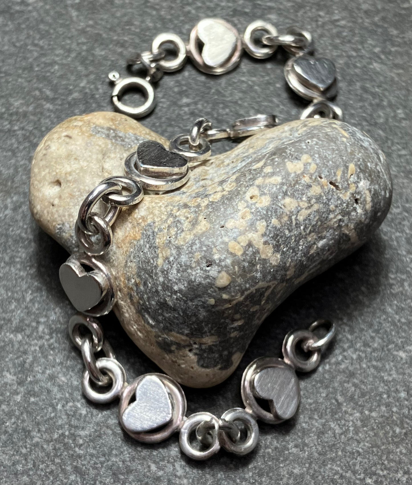 Absolutely beautifully made and constructed vintage sterling silver heart bracelet. 1981