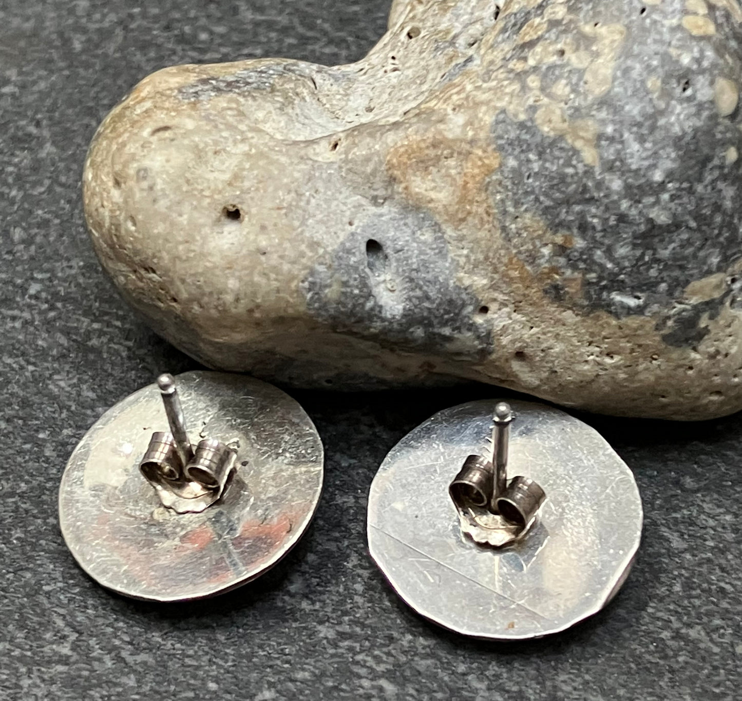 Super vintage sterling silver Native American earrings. Depicting a happy dancer.