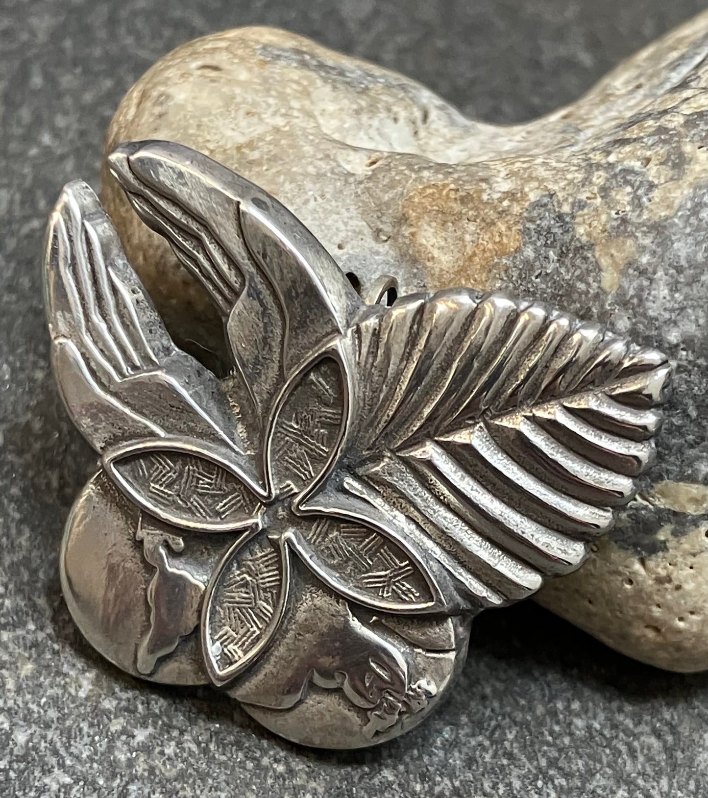 Vintage sterling silver pendant and brooch.