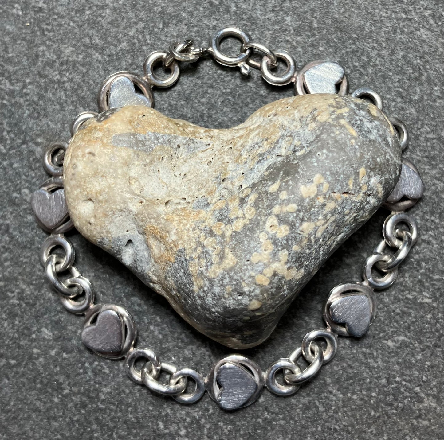 Absolutely beautifully made and constructed vintage sterling silver heart bracelet. 1981