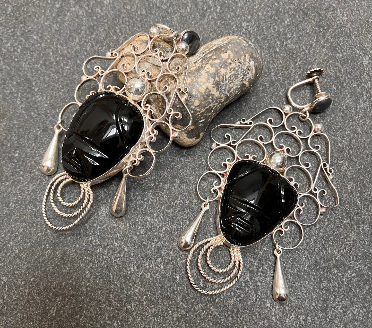 Absolutely spectacular vintage sterling silver Mexican warrior earrings.