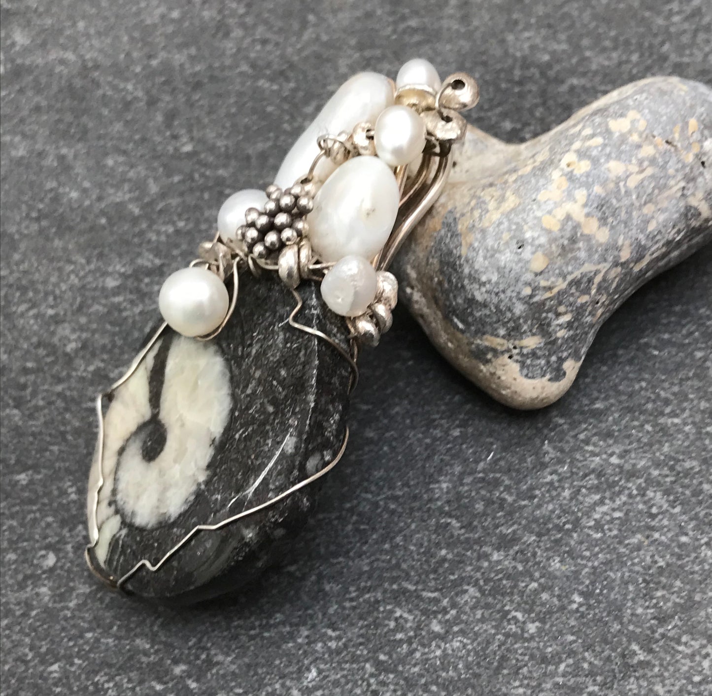 Unique handmade ammonite fossil, pearl and silver pendant.