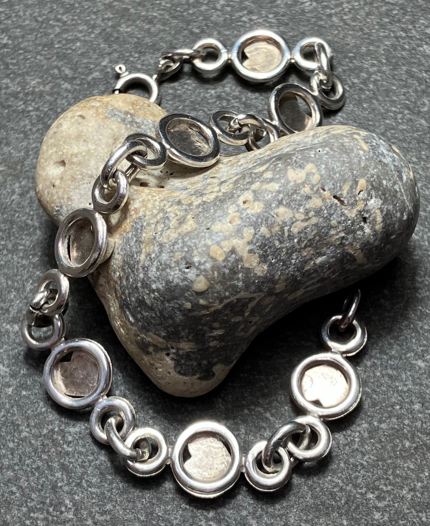 Absolutely beautifully made and constructed vintage sterling silver heart bracelet. 1981