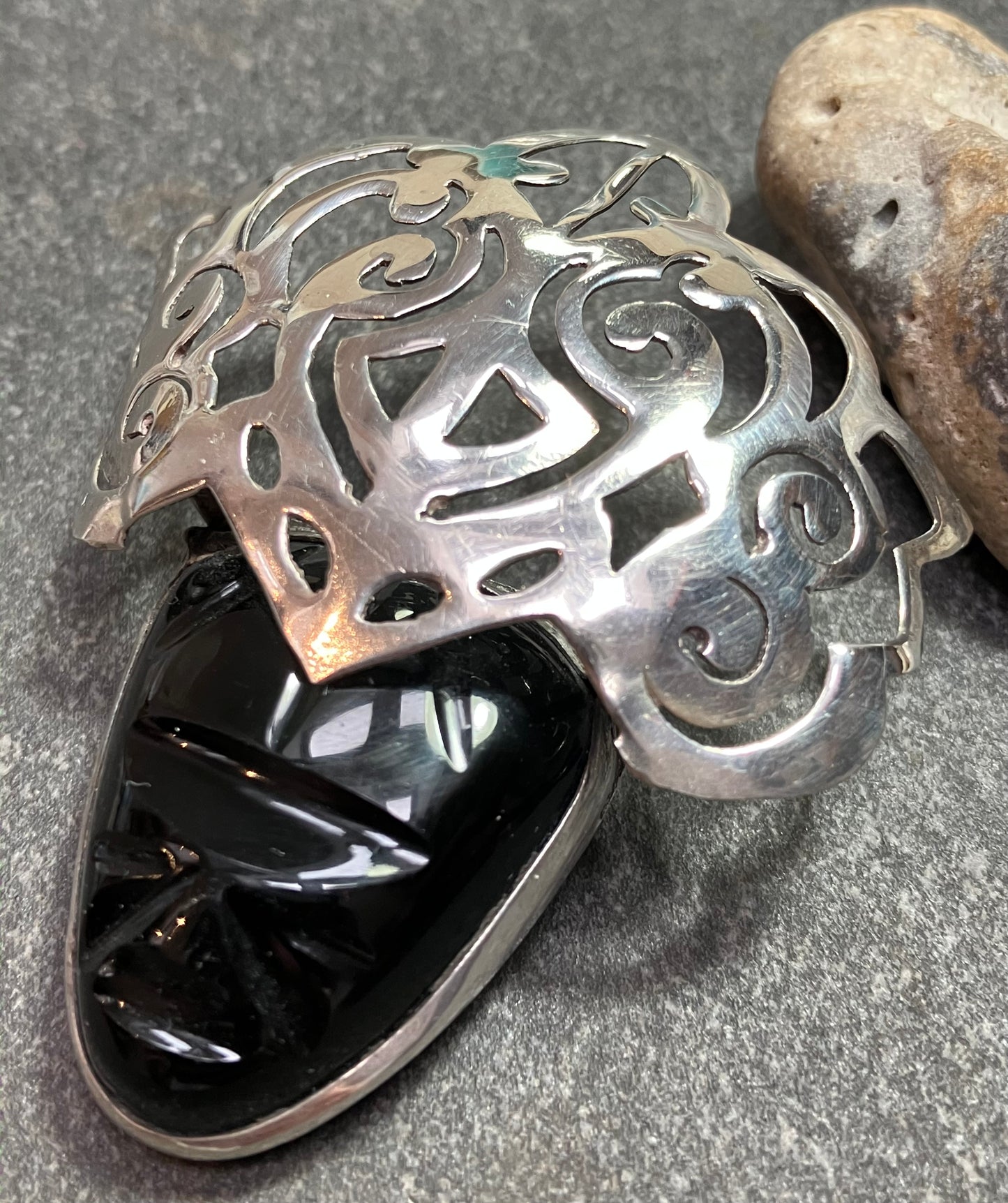 Vintage Mexican onyx and sterling silver warrior brooch.