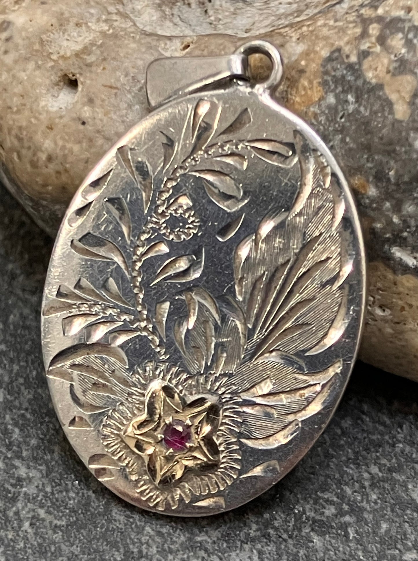 Beautiful vintage sterling silver pendant with a Ruby. 1983