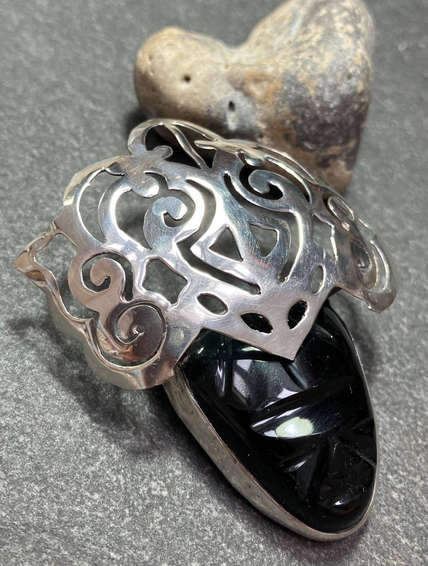 Vintage Mexican onyx and sterling silver warrior brooch.