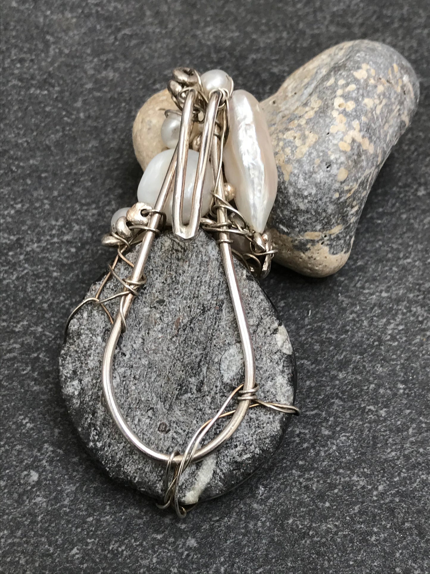 Unique handmade ammonite fossil, pearl and silver pendant.