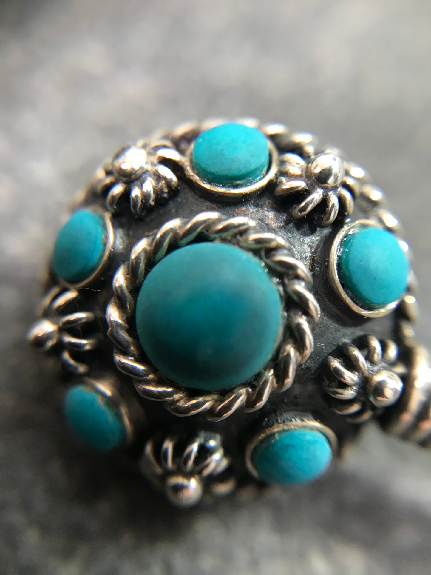 Vintage sterling silver key brooch with lovely turquoise cabochons.