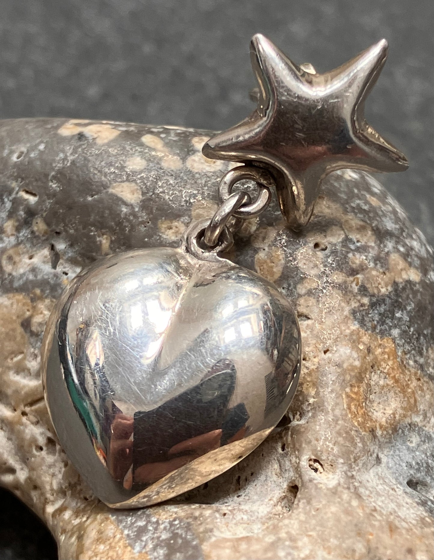 Super vintage sterling silver star and heart earrings.