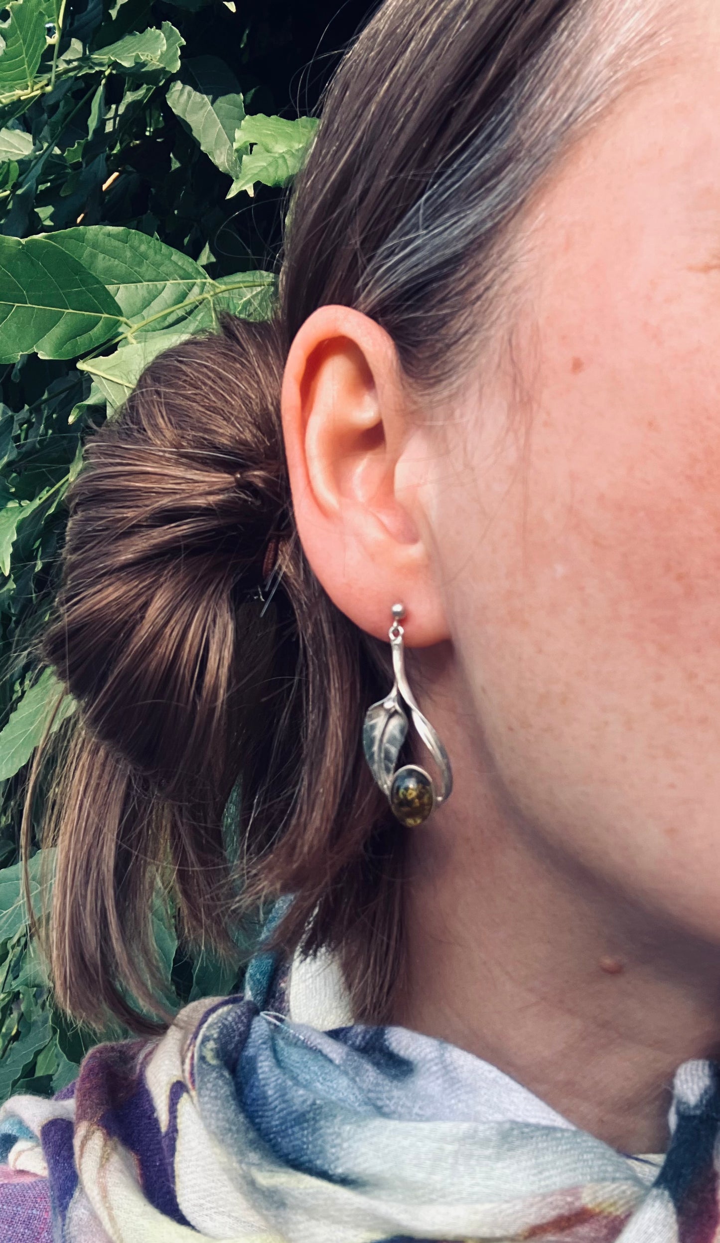 Vintage sterling silver and amber cabochon stone earrings.