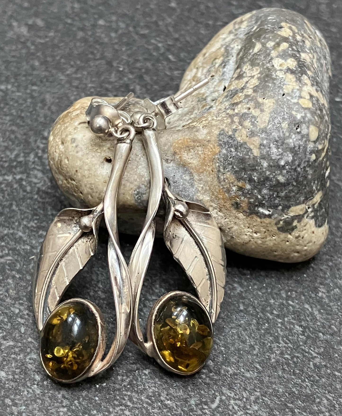 Vintage sterling silver and amber cabochon stone earrings.