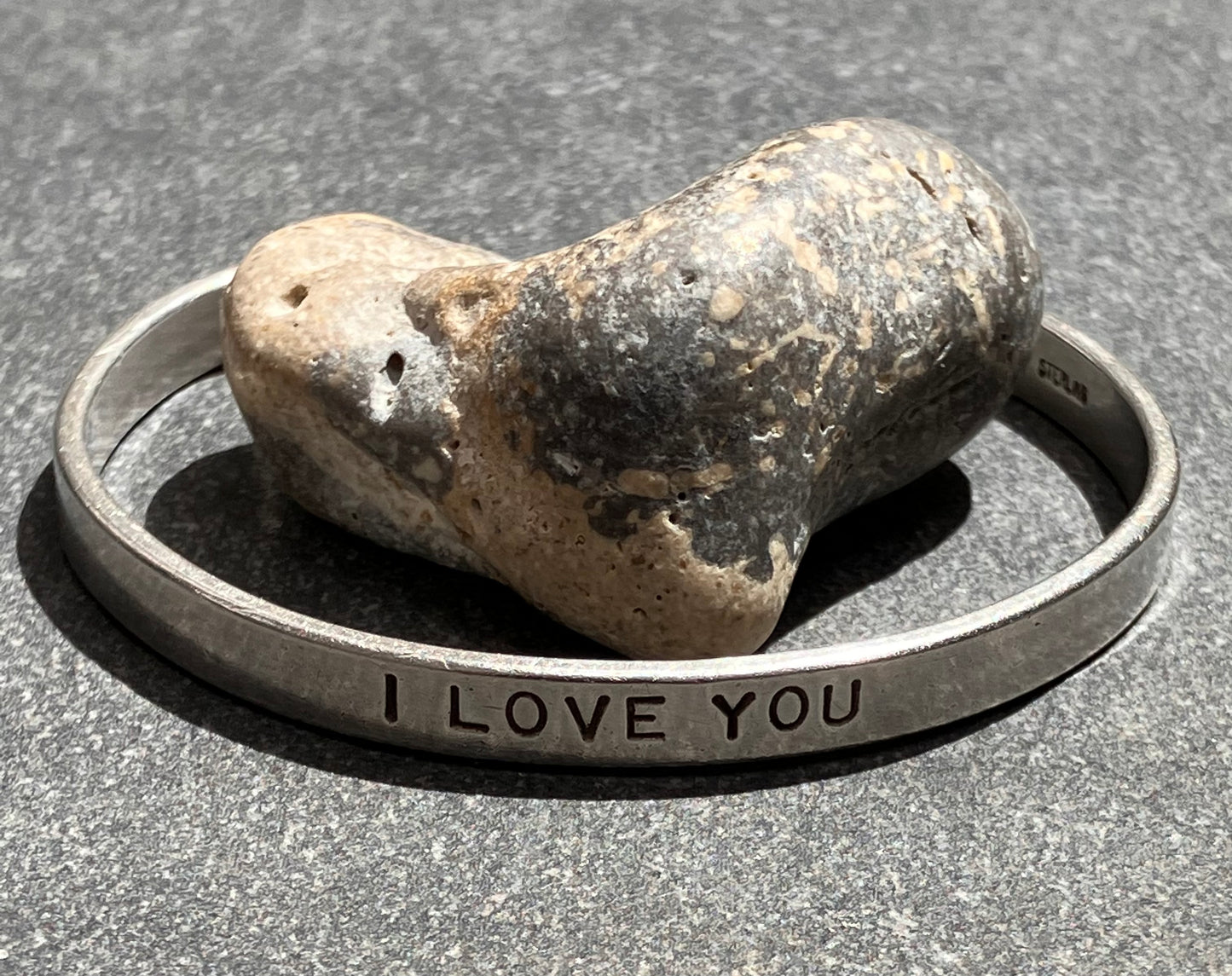 Vintage sterling silver ‘I love you’ bangle