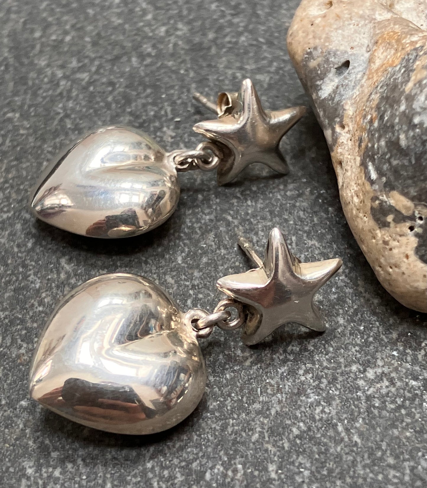 Super vintage sterling silver star and heart earrings.