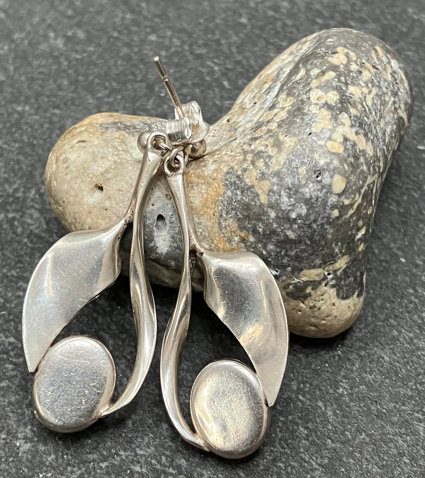 Vintage sterling silver and amber cabochon stone earrings.