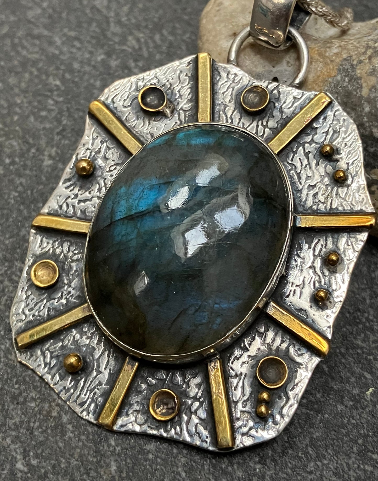 Artisan sun pendant with Labradorite cabochon.